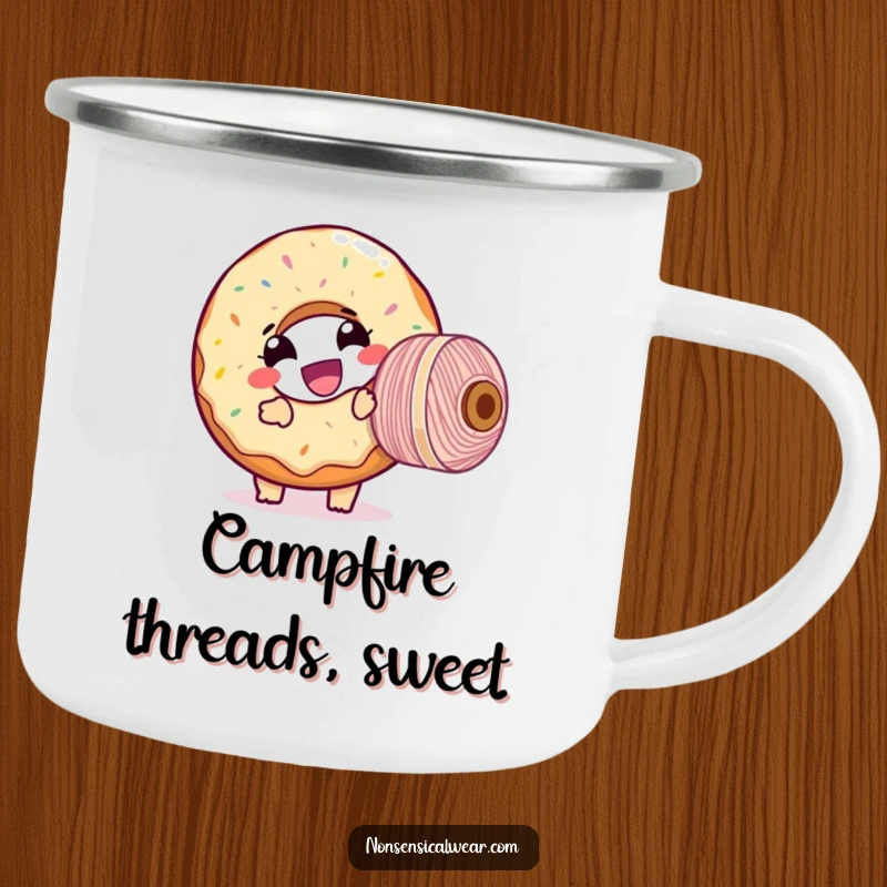 Funny camping mug featuring a giggling donut character comically tangled with a large spool of thread, ideal for outdoor craft enthusiasts.