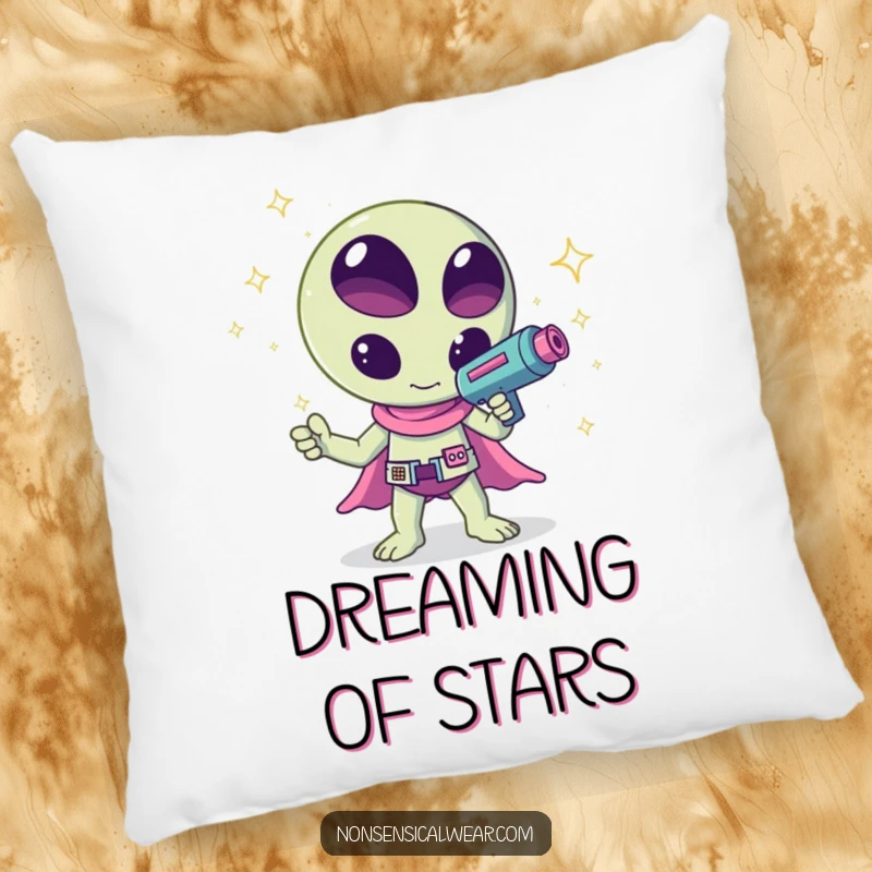 Funny kawaii alien waving a ray gun that shoots sparkles, a humorous and cuddly design on this pillow, great for comfort.