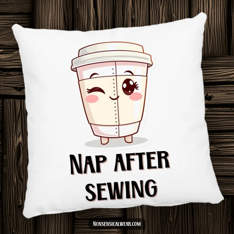 Funny pillow featuring a winking coffee cup character proudly displaying a perfectly sewn seam, adding humorous and cozy decor.
