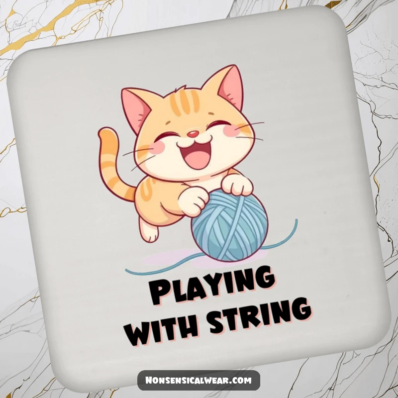 Funny drink coasters depicting a mischievous cat character gleefully pouncing on a ball of yarn, perfect for adding humor to tabletops.