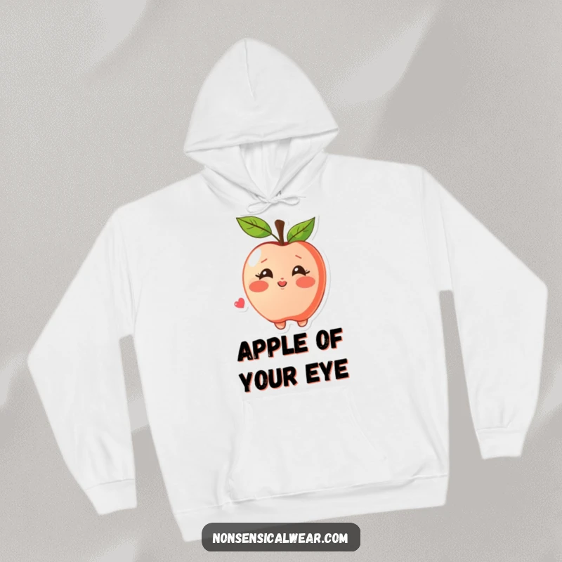 Funny hoodie featuring a blushing apple character joyfully blowing a kiss, perfect for spreading warmth and affection.