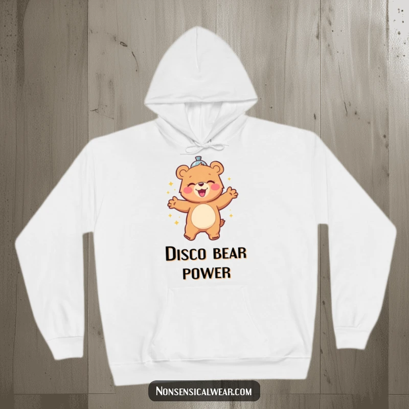 Funny hoodie design featuring a cheerful bear character gleefully dancing with a disco ball, full of festive spirit and joy.