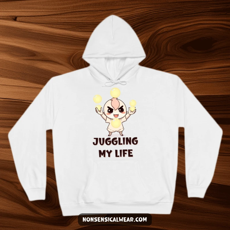 Funny hoodie featuring a mischievous character juggling glowing orbs, radiating an aura of playful magic and fun, perfect for staying warm and stylish.