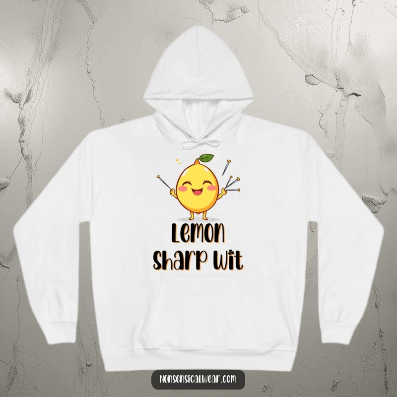 Funny hoodie featuring a happy lemon character with a silly grin, juggling sharp sewing needles with surprising dexterity.