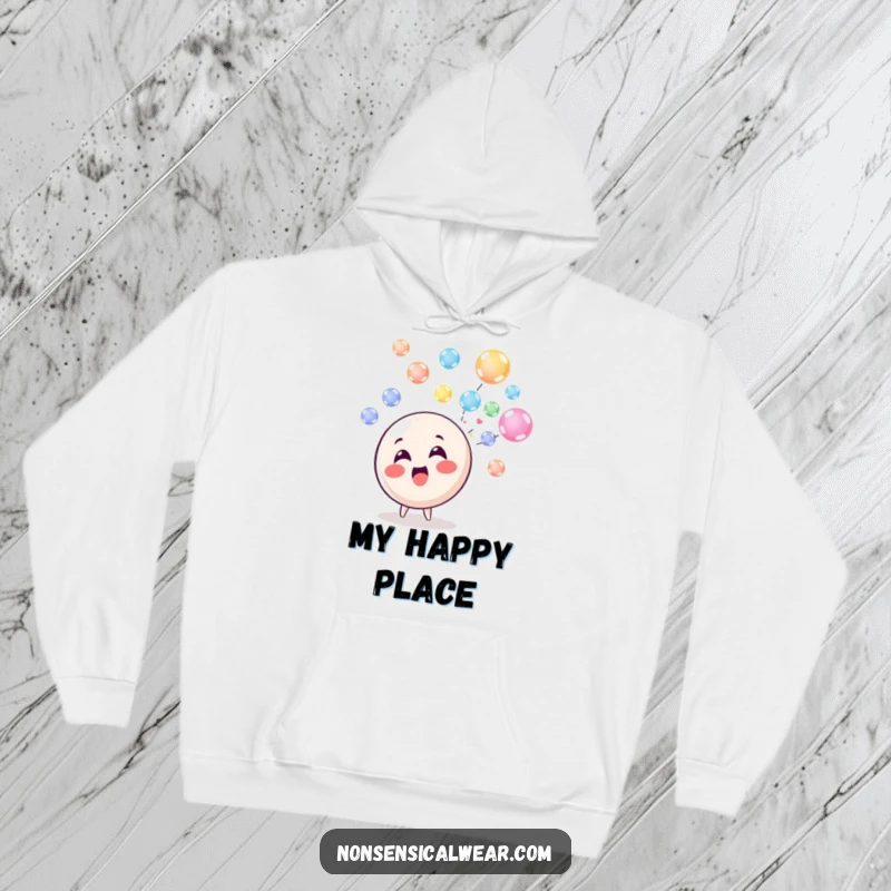 Funny Hoodie: A delighted circle character happily blowing a stream of colorful, floating bubbles, perfect for cozy, cheerful days.