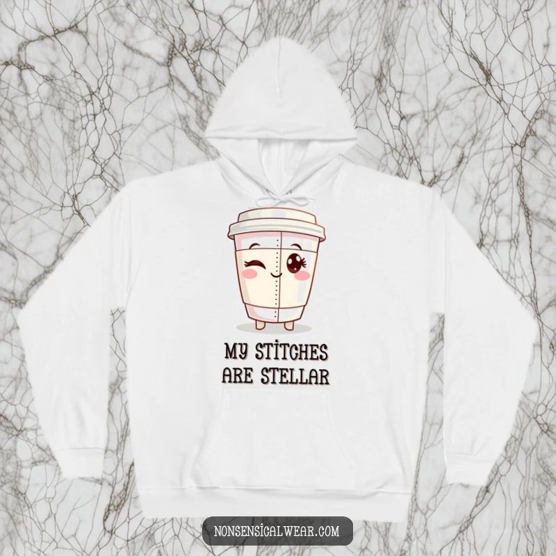 Funny hoodie with a winking coffee cup character proudly displaying a perfectly sewn seam, offering cozy humor for crafters.