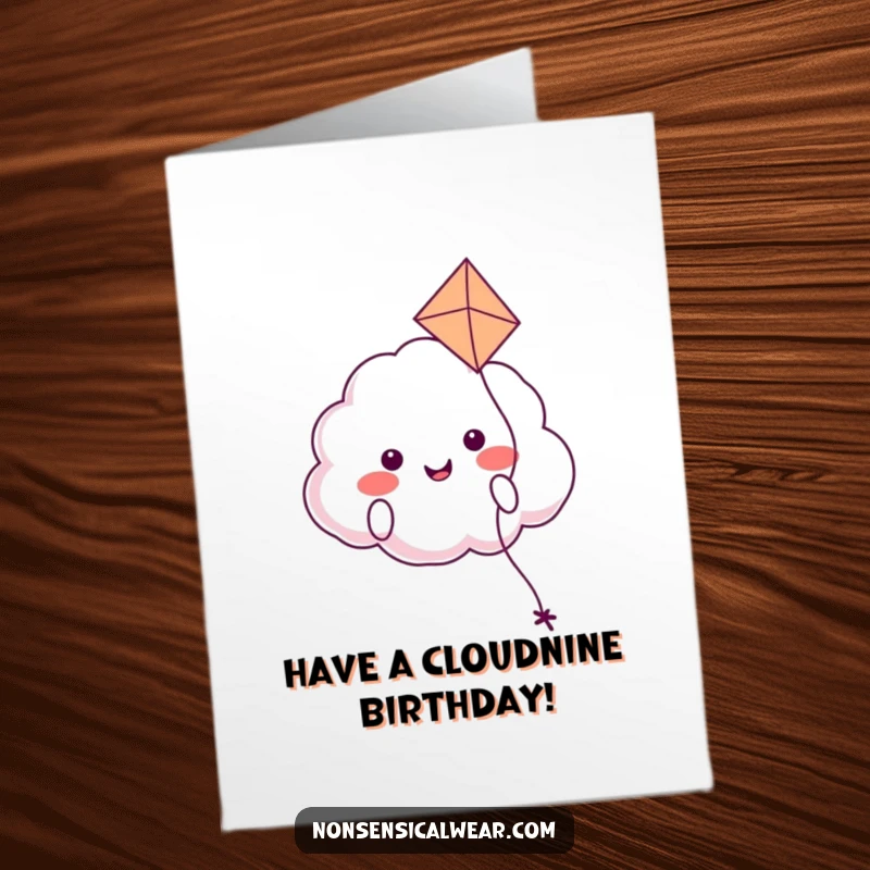 Happy free printable birthday card: a smiling cloud character happily floating with a colorful kite, embodying birthday joy.
