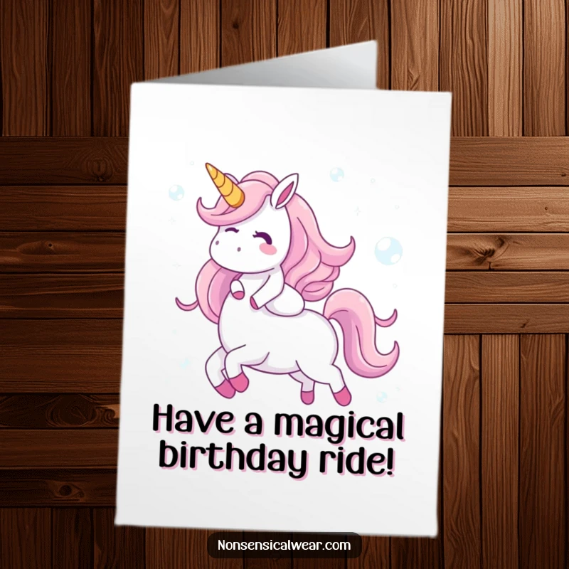 Funny Free Printable Birthday Card: Giggling character rides a majestic unicorn composed entirely of shimmering, iridescent bubbles.