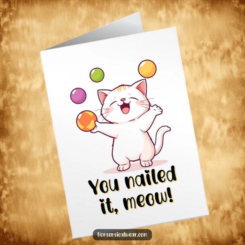 Funny Free Printable Congratulations Card featuring a kawaii cat enthusiastically juggling three vibrant balls, celebrating their win.