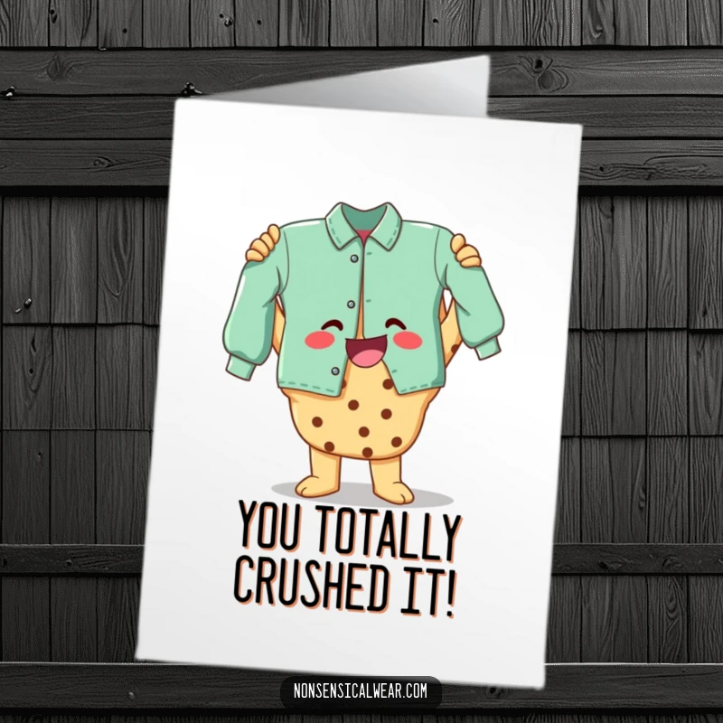 Funny free printable congratulations card with a happy cookie character showing off a completed garment, celebrating a win.