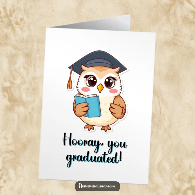 Funny Free Printable Owl Congratulations Card: Wise owl in graduation cap holds book, celebrating academic success with a proud smirk.