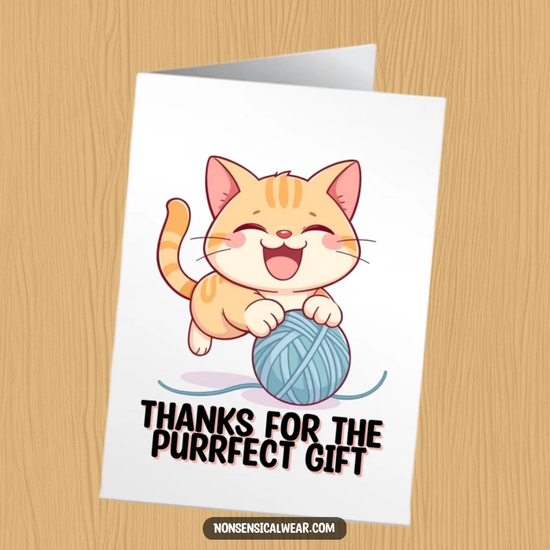 Funny Free Printable Cat Thank You Card with a mischievous cat pouncing on yarn, expressing thanks with playful energy.