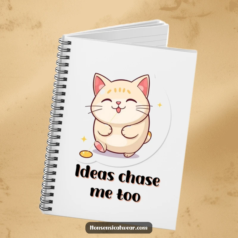 Funny notebook with a round cat enthusiastically chasing a red laser pointer dot, ideal for jotting down humorous thoughts.