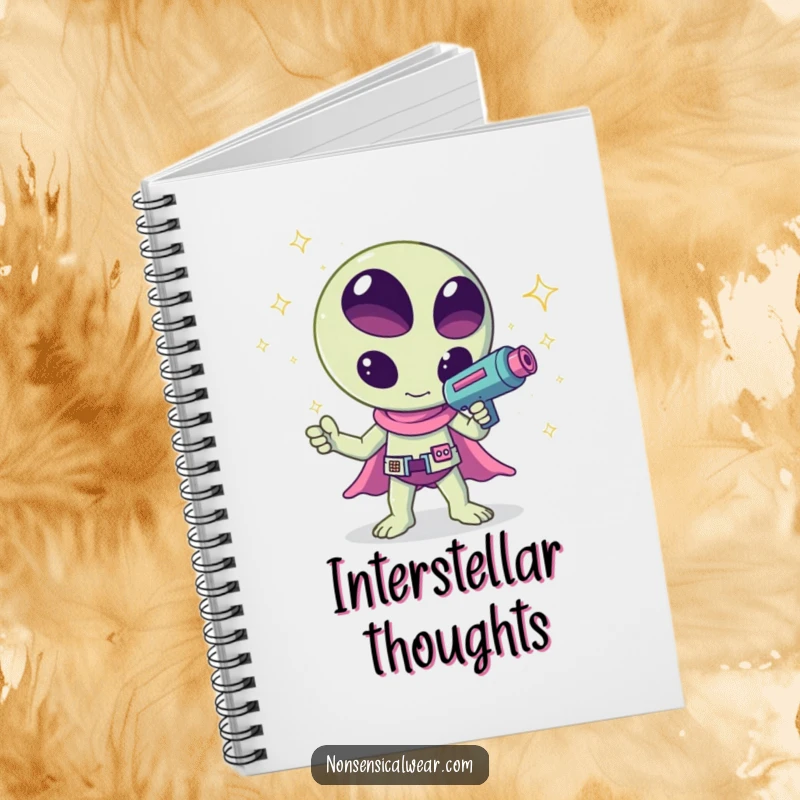 Funny kawaii alien waving a ray gun that shoots sparkles, a humorous and cute design on this notebook, perfect for jotting notes.