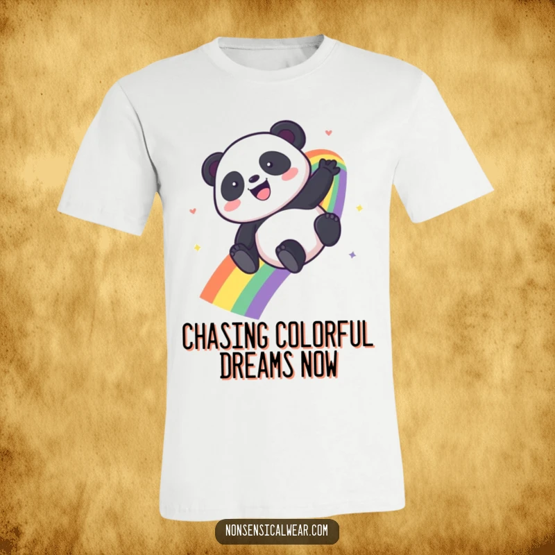 Funny Kawaii Panda t-shirt depicting a happy panda sliding down a bright rainbow, full of glee.