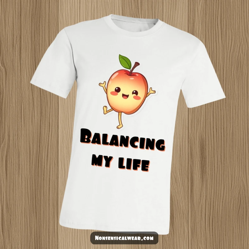 Funny T-Shirt: Cheerful apple character balancing perfectly in a handstand with a happy expression.