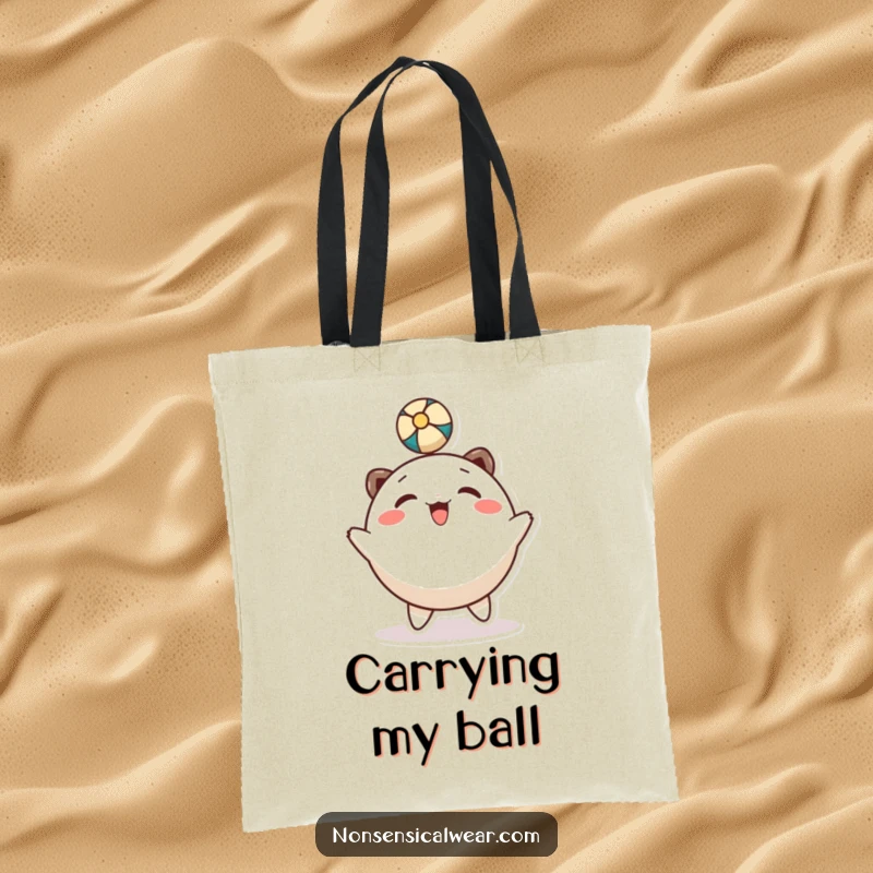 Funny tote bag: a smiling, round character energetically bounces a ball using its head.